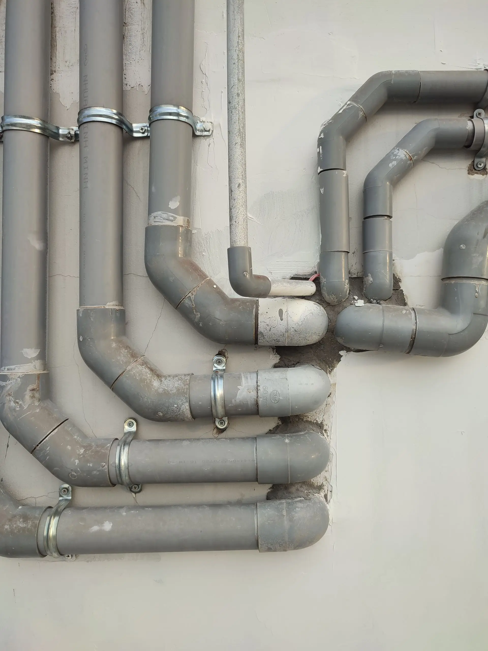 Central heating system being inspected for leaks in a London home